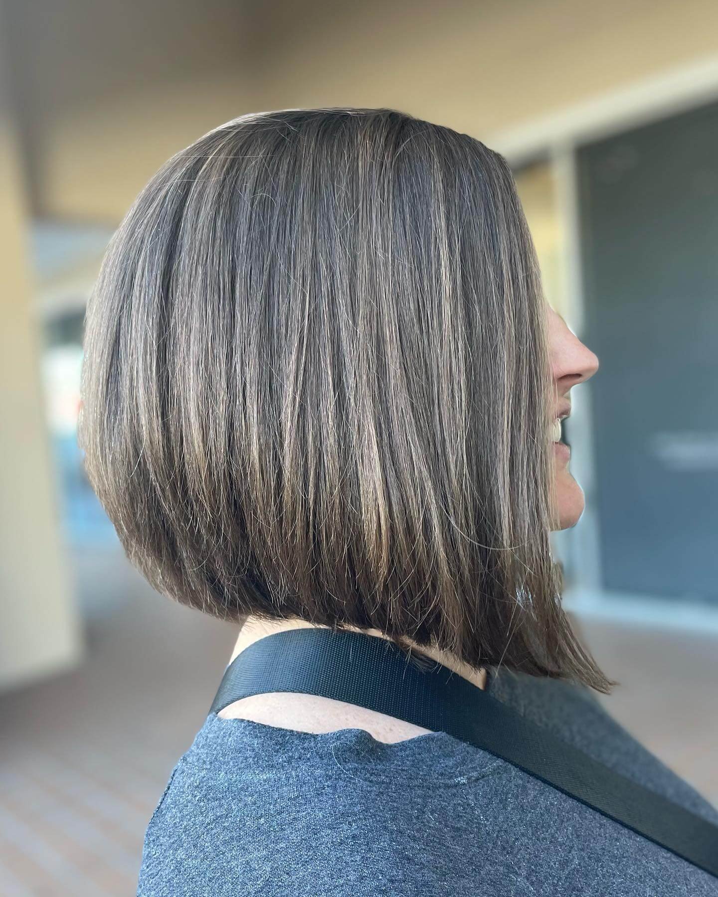Bold, inverted bob with choppy layers for a dramatic and edgy style