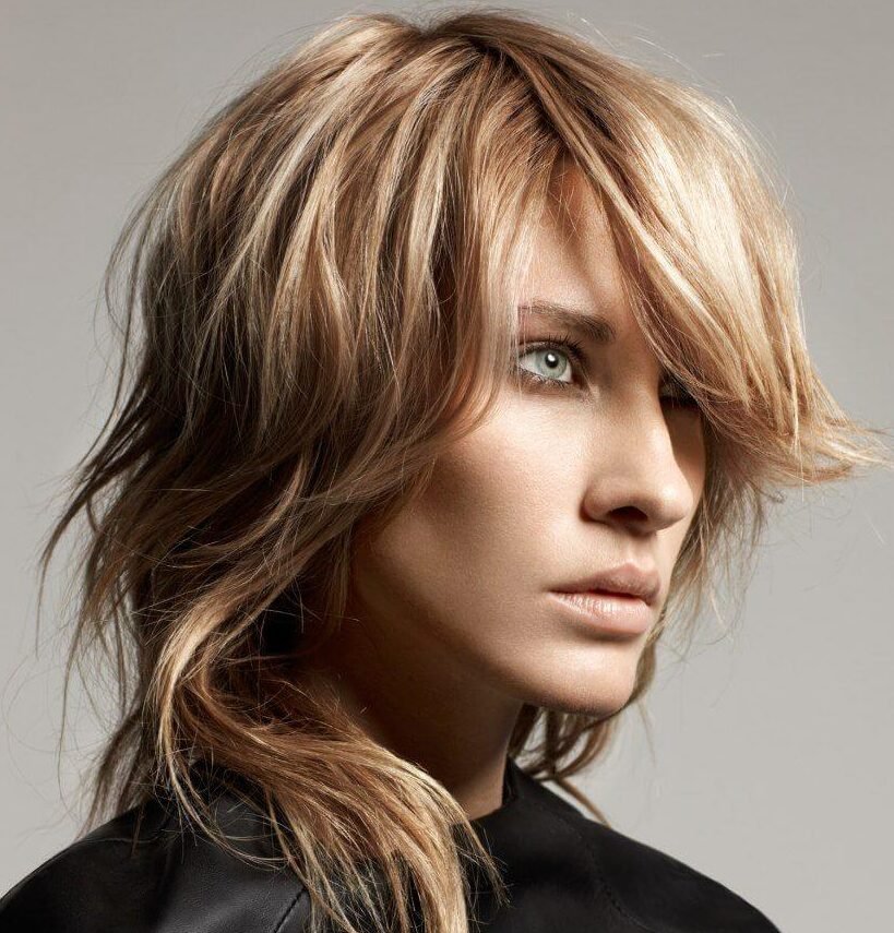 Cascading shaggy hairstyle with layers, offering movement and texture for a dynamic look