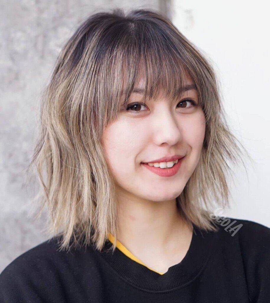 Short Korean Hairstyle for Round Faces With Flattering Bangs